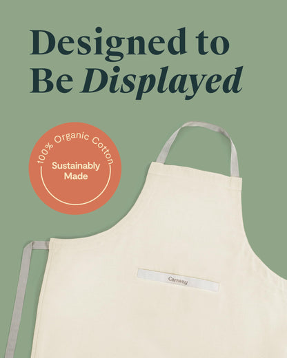 Caraway Apron - 100% Organic Cotton Apron - Features 2 Pockets & Adjustable Neck Strap - Absorbs Liquids & Dissipates Heat With Ease - Machine Washable - One Size - Cream